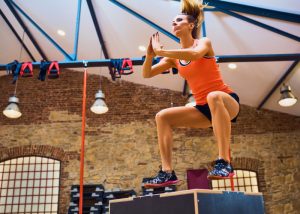 woman doing box jumps as part of her plyometric workout